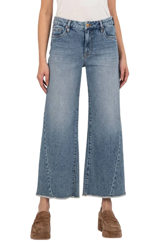 Meg High Rise Wide Leg Jeans In Defiant With Med Base Wash